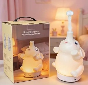 lot 11125 image: Morbou Rotating Elephant Diffuser with Color Gradient Light, Ultrasonic Silent Essential Oil Diffuser for Home Bedroom and Office, Cute Decorative Humidifier with Remote Control