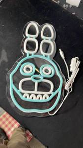 lot 10462 image: Neon Sign Light Fixture Turquoise and White Monster Face Design Friday night at Freddy��s
