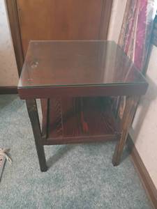 lot 902 image: Small Wooden Table with Glass Top. 24 x 20 x 20.   Located upstairs