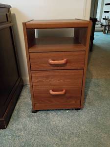 lot 916 image: 2 Drawer Filing Cabinet with Wheels    25 x 14 x 16.  Located upstairs