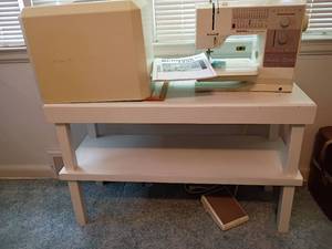 lot 921 image: Bernina 1230 Sewing Machine with Carrying Case and Table.  Table is 24 x 38 x 14.5.   Located upstairs