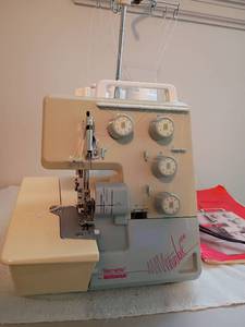 lot 923 image: Another Bernette for Bernina.  Fun Lock 004.  With Carrying Case.   Located upstairs