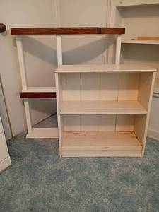 lot 929 image: 2 Wooden Bookshelves.   Smallest 25 x 24 x 9.  The other 35 x 24 x 9