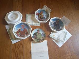 lot 942 image: 4 John Wayne Collector Plates.   8in.    One is missing COA.  Also, a letter from Michael Wayne, Wayne Enterprises