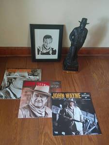 lot 945 image: John Wayne Decanter, 19in. tall, Calenders and Picture, 13 x 11