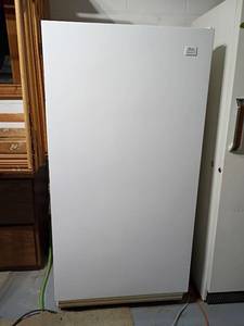 lot 951 image: Amana Freezer.   Works.  No light inside.  Located in basement.  61 x 30 x 31