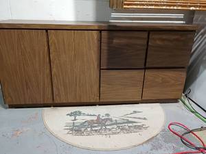 lot 952 image: 4 Drawer Cabinet with Side Storage.  Needs a little TLC.  30 x 69.5 x 18.   Located in basement