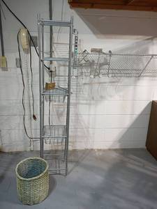lot 954 image: Small Wire Shelf with Drawers, Over the Door Hooks and a Wicker Trash Can.    Shelf 65 x 12 x 12.   Located in basement