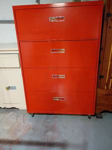 lot 956 image: Vintage Orange 4 Drawer Filing Cabinet on Wheels.   55 x 36 x 18.   Located in basement