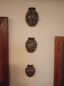 lot 967 image: Three Decorative Wall Vases    Largest is approximately 5 x 6.   Located in basement