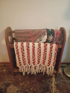 lot 970 image: Quilt Rack with Blankets.   Rack 32 x 30 x 11.   Located in basement