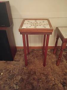 lot 983 image: Small Square Table with Glass Top and Coins under Glass.  41 Coins.  24 x 14 x 14.   Located in basement