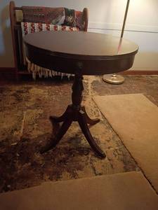 lot 987 image: Vintage Round Table with Drawer.  27 x 24.   Located in basement