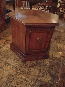 lot 988 image: Octagon Shaped Table with Bottom Storage.  21 x 24 x 24.  Located in basement