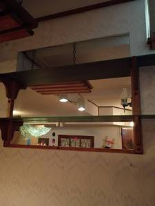 lot 997 image: Mirror Wall Shelf.  Will need to be removed from wall.   Approximately 27 x 48.  Located in basement