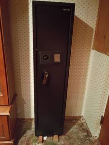 lot 1001 image: Gun Safe.  57 x 14 x 12.  Located in basement