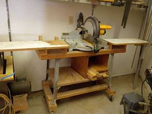 lot 1018 image: DeWalt 12in. Miter Saw with Work Table on Wheels with Contents.   Table is 51 x 78 x 24