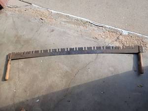 lot 1038 image: 2 Person Vintage Hand Saw.  60in long