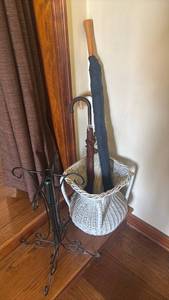 lot 1100 image: Basket with Umbrellas and Iron Stands