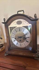 lot 1103 image: Bulova Tempus Fugit Mantel Clock with Cabinet and Glass Door