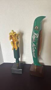 lot 1106 image: Leinenkugels Northwoods Amber and Hillbilly Tap Handles