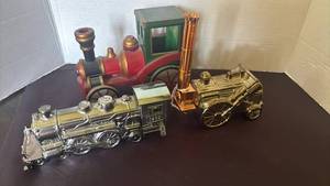 lot 1113 image: Wooden Train Engine with Avon Decorative Train Bottles