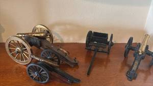 lot 1143 image: Miniature Cannon Models Lot of 4 Desktop Decorative Pieces