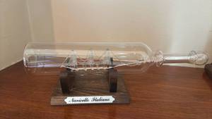 lot 1145 image: Navicello Italiano Glass Ship in Bottle Model with Wood Base