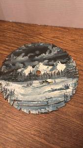 lot 1203 image: Hand-Painted Saw Blade Art Winter Mountain Landscape Scene
