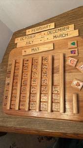 lot 1216 image: Wooden Perpetual Calendar with Month and Date Blocks 18x16
