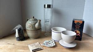 lot 1411 image: Tea Service Lot Teapot Water Bottle Cups Saucers Tea Box and Butter Bell Crock
