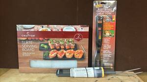 lot 1424 image: Crofton Slate Serving Board 2 Piece Set with Polder Electronic Thermometer Meat Fork