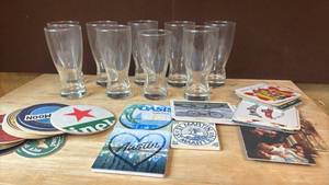 lot 1427 image: Set of 9 Clear Glass Pilsner Beer Glasses with Coasters