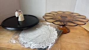 lot 1442 image: Amber Glass Cake Stand with Pedestal Base and Bride Groom Figurines