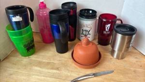 lot 1457 image: Travel Mugs and Tumblers with Saladmaster Knife and Terracotta Onion Plate