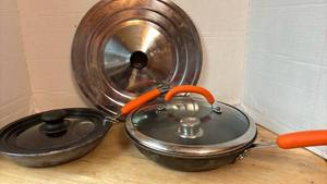 lot 1463 image: Rachael Ray Skillets with Orange Handle and Assorted Lids