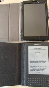 lot 1474 image: Amazon Kindle Keyboard and Basic E-Reader Lot of 2 with Cases