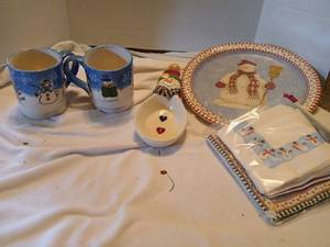 lot 1570 image: ChristmasSnow decor. Paper plates with napkins,  saucer, set of mugs,  plates and tealight house