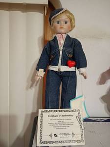 lot 1600 image: Porcelain Doll.  From the Knightsbridge Collection.  Has a COA.  Approximately 16.5in. tall