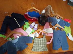 lot 1604 image: American Girl Doll and Baby Doll Clothes
