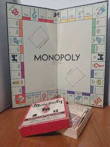 lot 1609 image: Monopoly Popular Edition Board Game and Clue. Both are not complete sets.