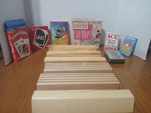 lot 1611 image: Uno, crazy eights,playing cards, Empire jump, and  wooden card holders