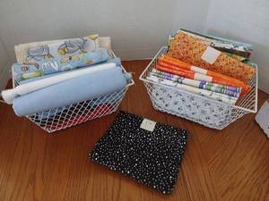 lot 1630 image: Fabric in baskets