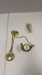 lot 1800 image: Pocket watches and bullet bottle opener