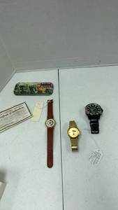 lot 1804 image: Lionel Collectible Train Watch with Certificate, State Farm watch and Stauer watch