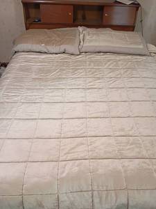 lot 2002 image: Queen sized Bedding.     Comforter, Pillows with Shams and Mattress Protector