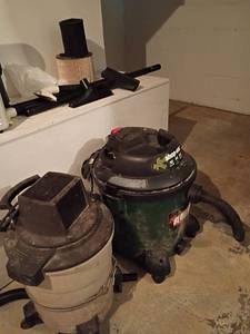 lot 3005 image: 2 Shop Vacs. One 12 Gallon, With Extra Parts.  See pictures.  Located in basement