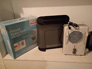 lot 3006 image: DeLonghi Heater, Honeywell Heater and Walgreens Raised Toilet Seat