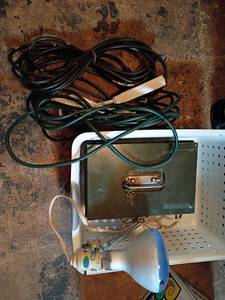 lot 3020 image: Metal Lock Box with Key, Clamp Light and Extension Cords.   Located in basement