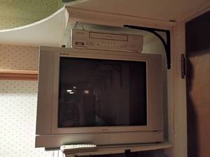 lot 3029 image: RCA 21in Television with Emerson VHS Player.   Located in basement